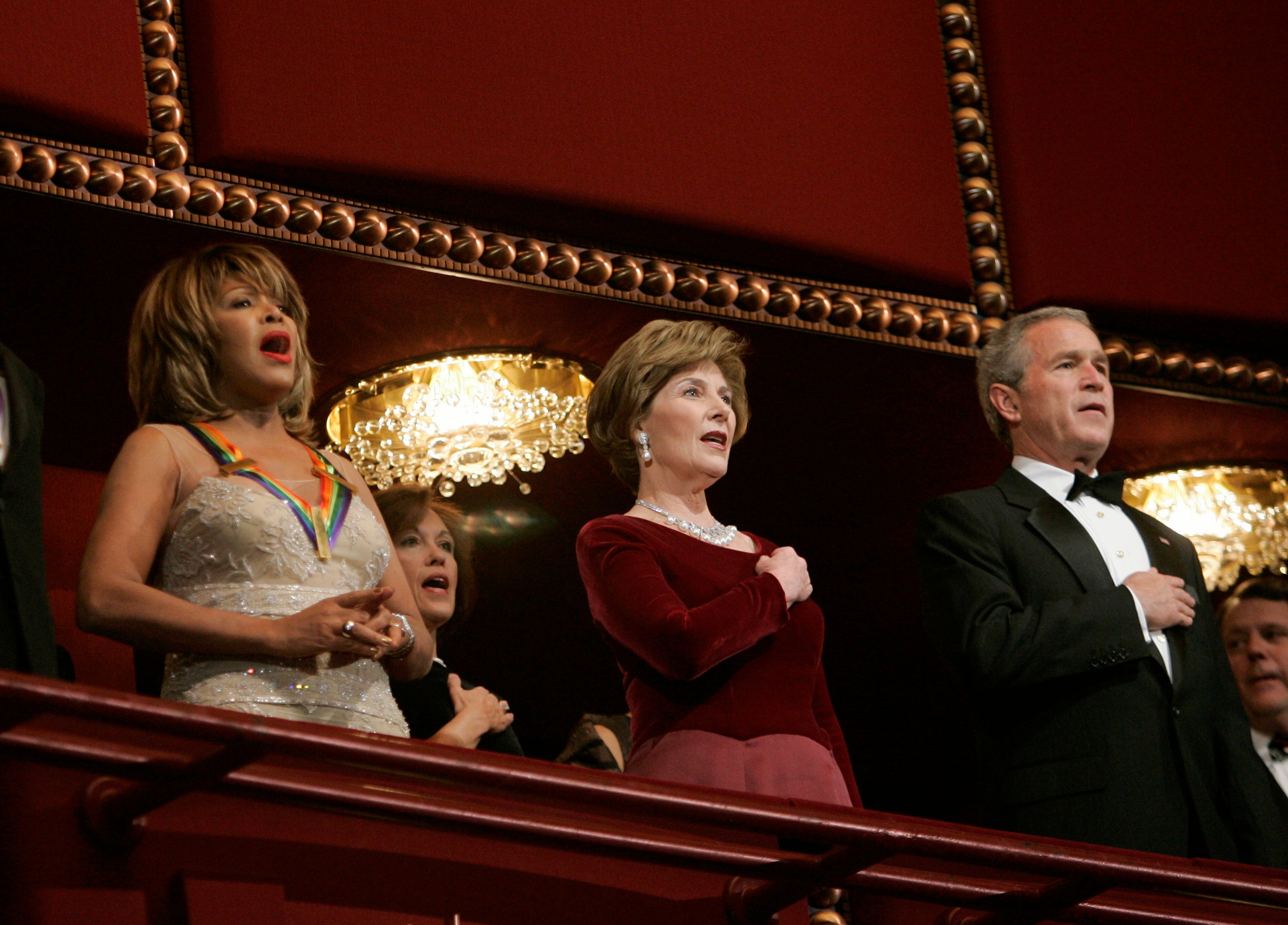 President Bush, right, and first lady Laura Bush, center, stand with singer Tina Turner