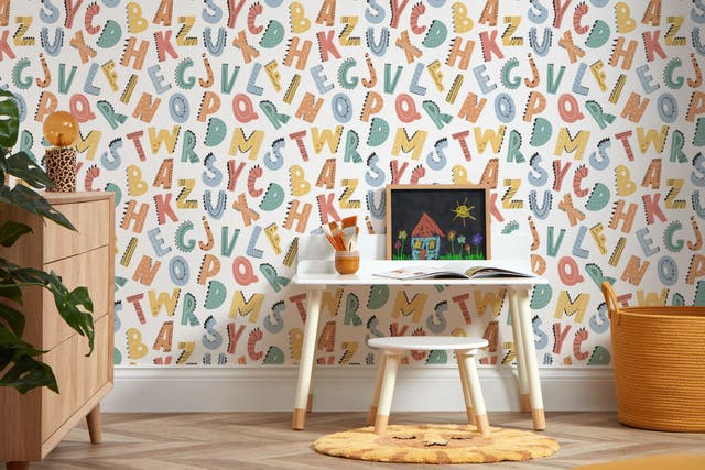 Dino Alphabet Wallpaper in Multicoloured from I Love Wallpaper (I Love Wallpaper/PA)