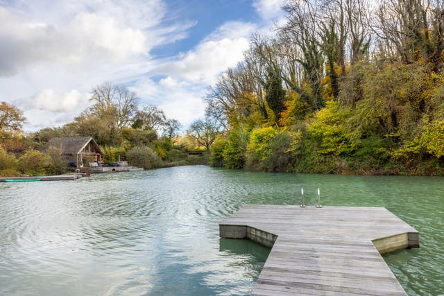 <p>Some stays, such as Ditchling Cabin, offer their own private lakes </p>