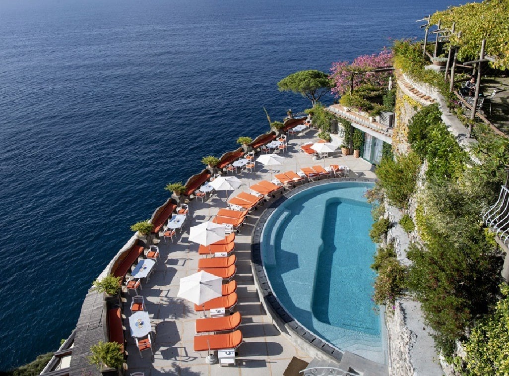 Take a dip in the pool overlooking the sea or use the hotel’s private beach