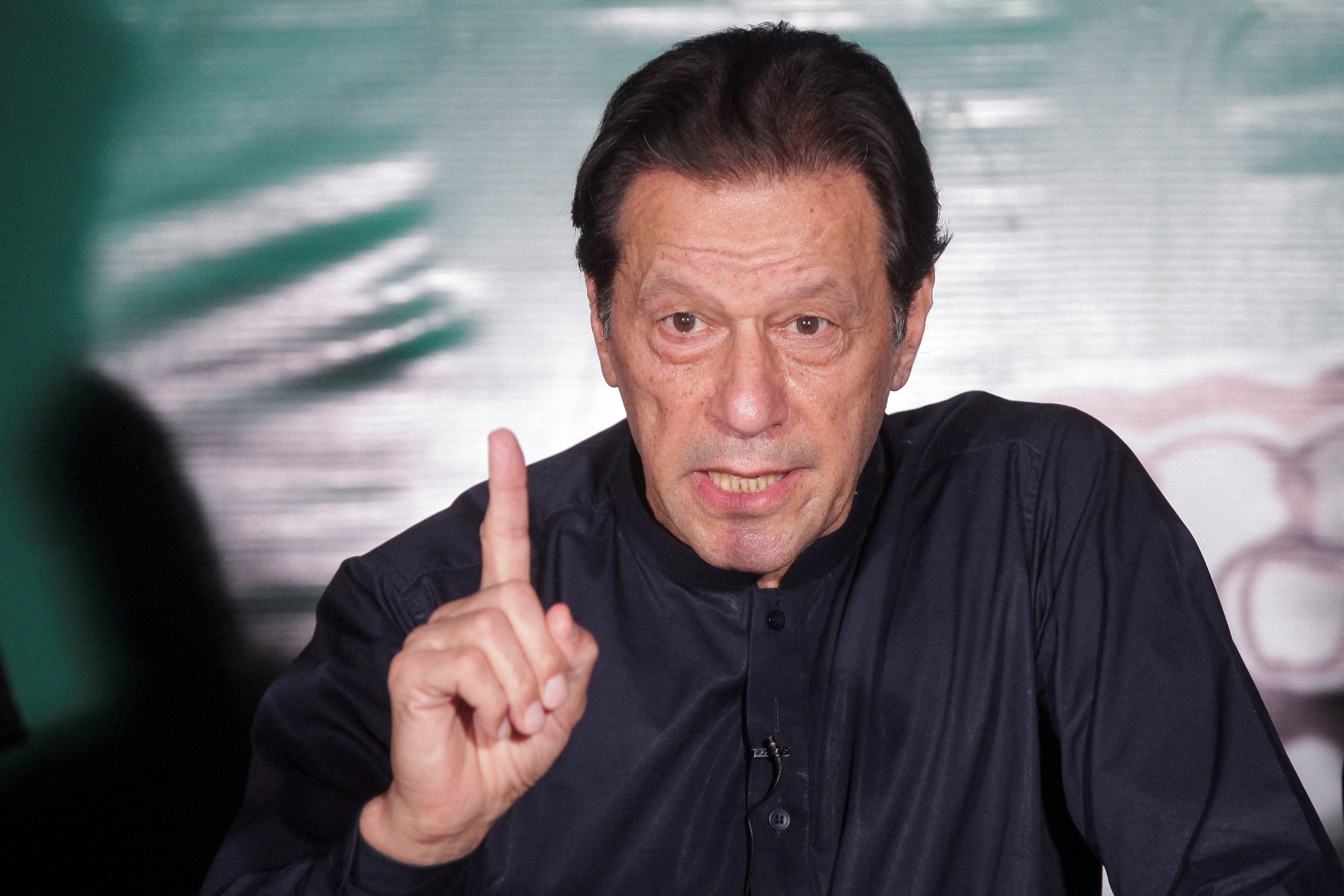 File. Pakistan’s former prime minister Imran Khan gestures as he speaks to the members of the media at his residence in Lahore on 18 May 2023