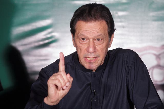 <p>File. Pakistan’s former prime minister Imran Khan gestures as he speaks to the members of the media at his residence in Lahore on 18 May 2023 </p>
