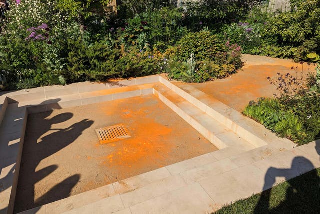 The scene after three people were arrested at Chelsea Flower Show on suspicion of criminal damage in connection with a Just Stop Oil protest (@MetPoliceEvents/Twitter/PA)