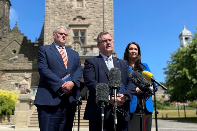 DUP leader Sir Jeffrey Donaldson along with party colleagues Gavin Robinson and Emma Little Pengelly outside Stormont Castle after a meeting with the head of the NI Civil Service Jayne Brady (David Young/PA)