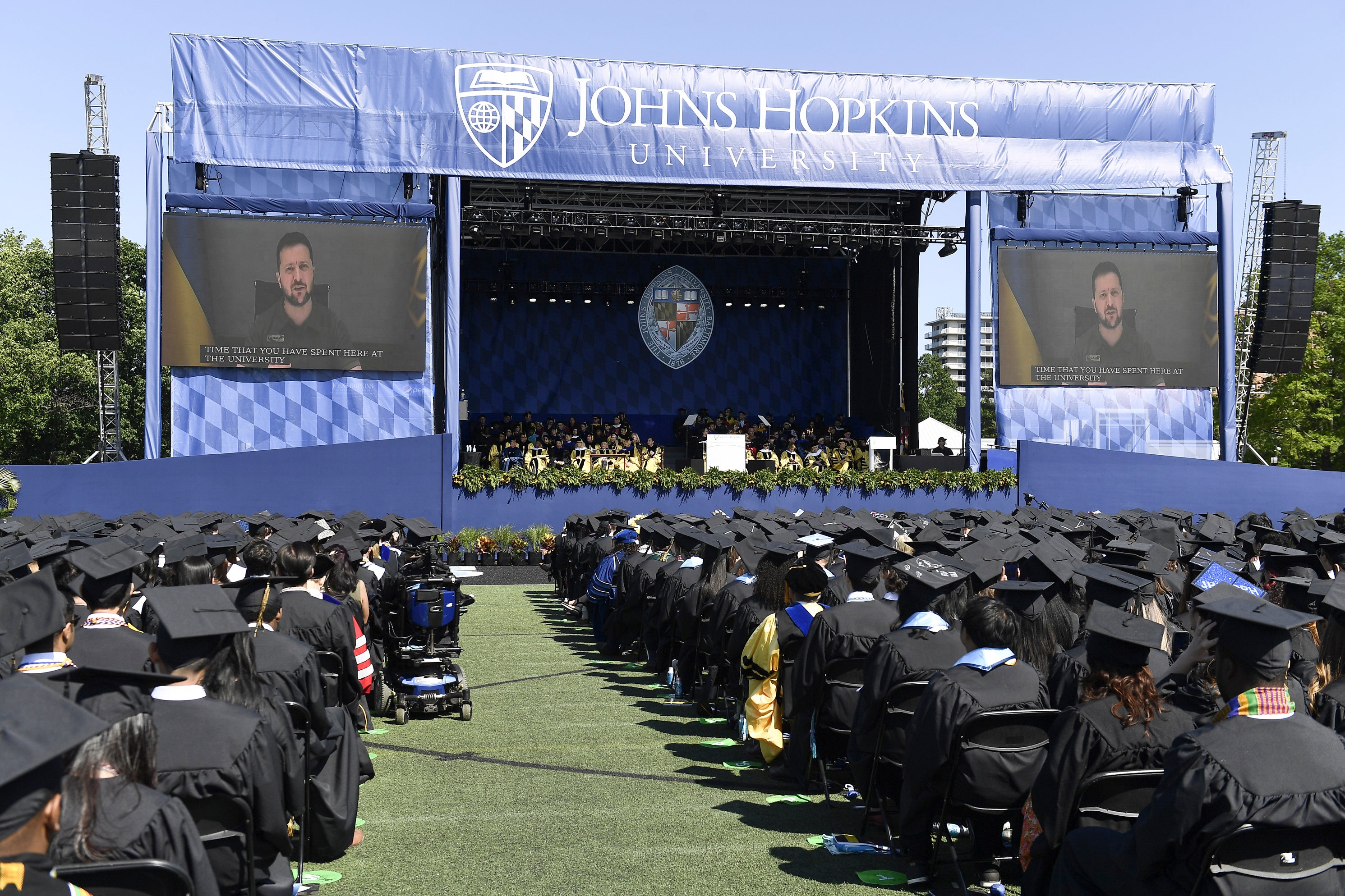 <p>Ukrainian President Volodymyr Zelensky addresses the graduating class of Johns Hopkins University via livestream from Ukraine,</p><p>” height=”1988″ width=”2982″ layout=”responsive” class=”i-amphtml-layout-responsive i-amphtml-layout-size-defined” i-amphtml-layout=”responsive”><i-amphtml-sizer slot=