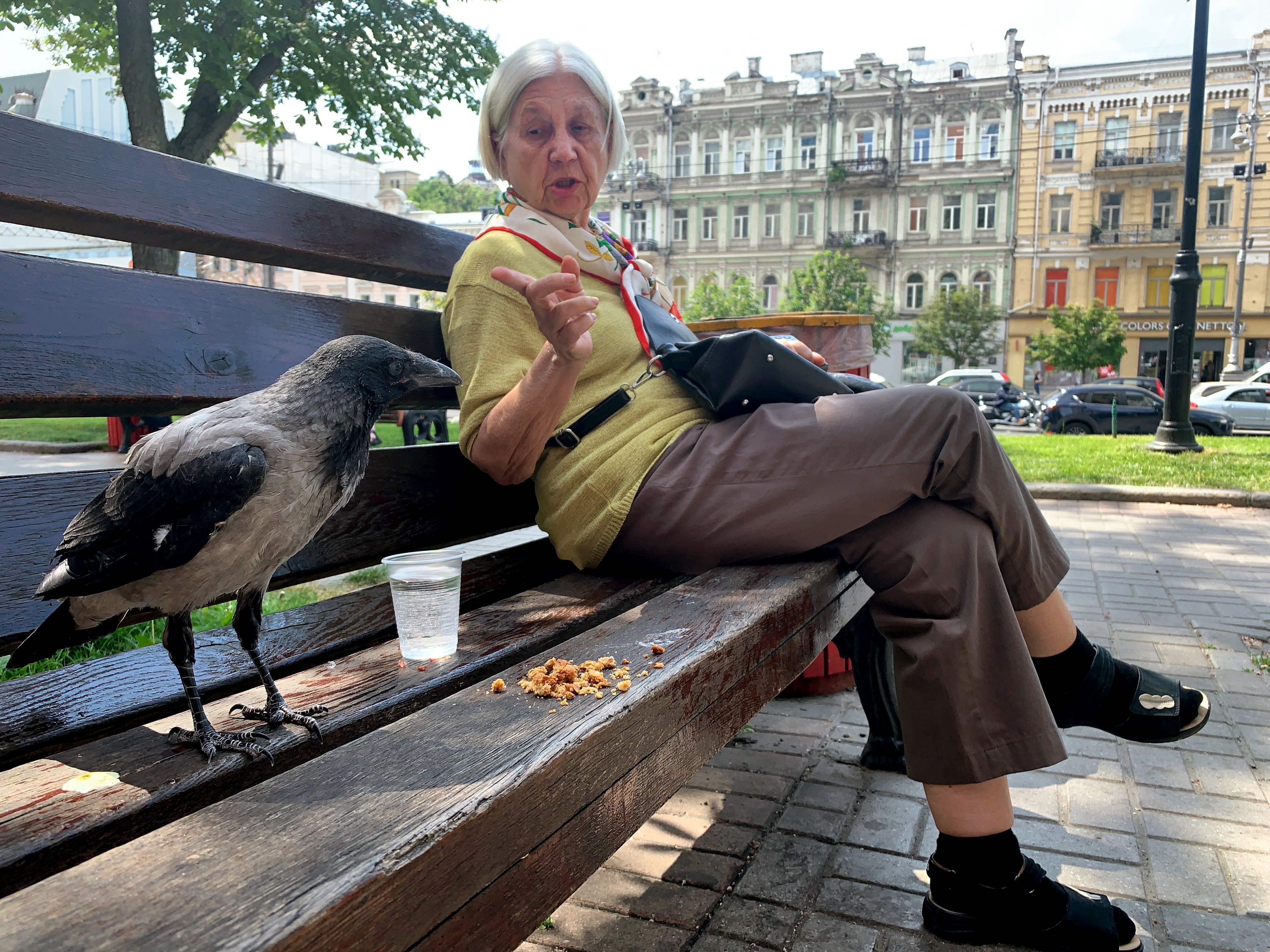 <p>This picture taken with a smartphone shows an elderly woman gesturing to a crow as they sit on a bench during a warm spring day, in the centre of the Ukrainian capital Kyiv</p><p>” height=”3024″ width=”4032″ layout=”responsive” class=”i-amphtml-layout-responsive i-amphtml-layout-size-defined” i-amphtml-layout=”responsive”><i-amphtml-sizer slot=