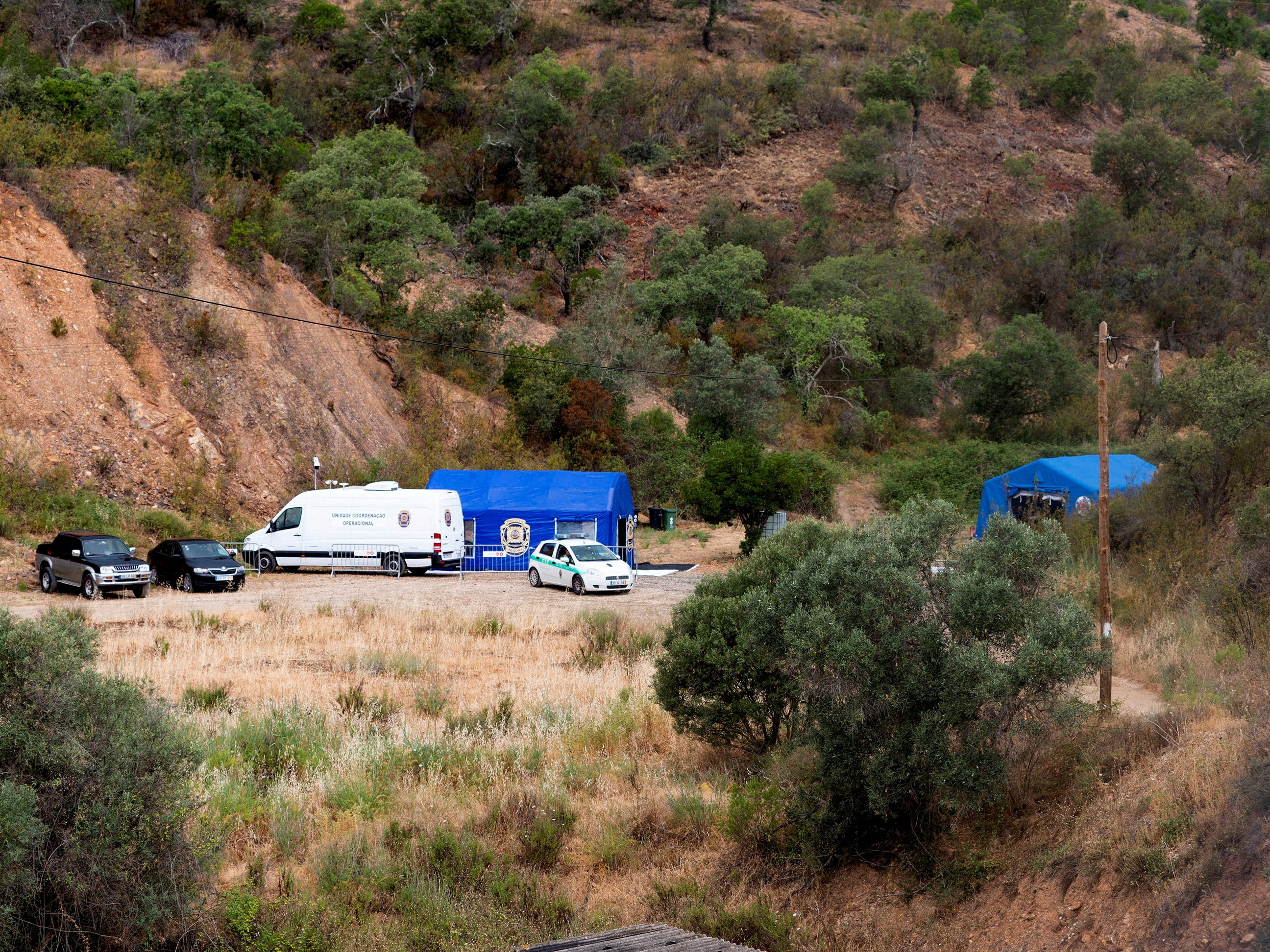 <p>Vehicles and tents of Portugal’s investigative Judicial Police are seen at the site of a remote reservoir where a new search for the body of Madeleine McCann is set to take place, in Silves</p><p>” height=”1944″ width=”2592″ layout=”responsive” class=”i-amphtml-layout-responsive i-amphtml-layout-size-defined” i-amphtml-layout=”responsive”><i-amphtml-sizer slot=