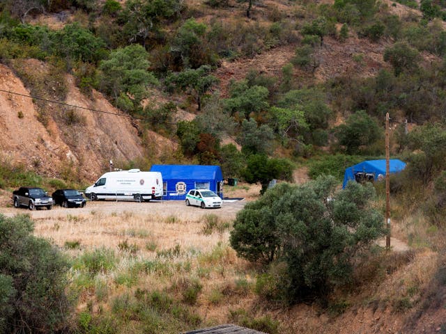<p>Police are seen at the site of a remote reservoir where a new search for the body of Madeleine McCann took place last week, in Silves, Portugal</p>