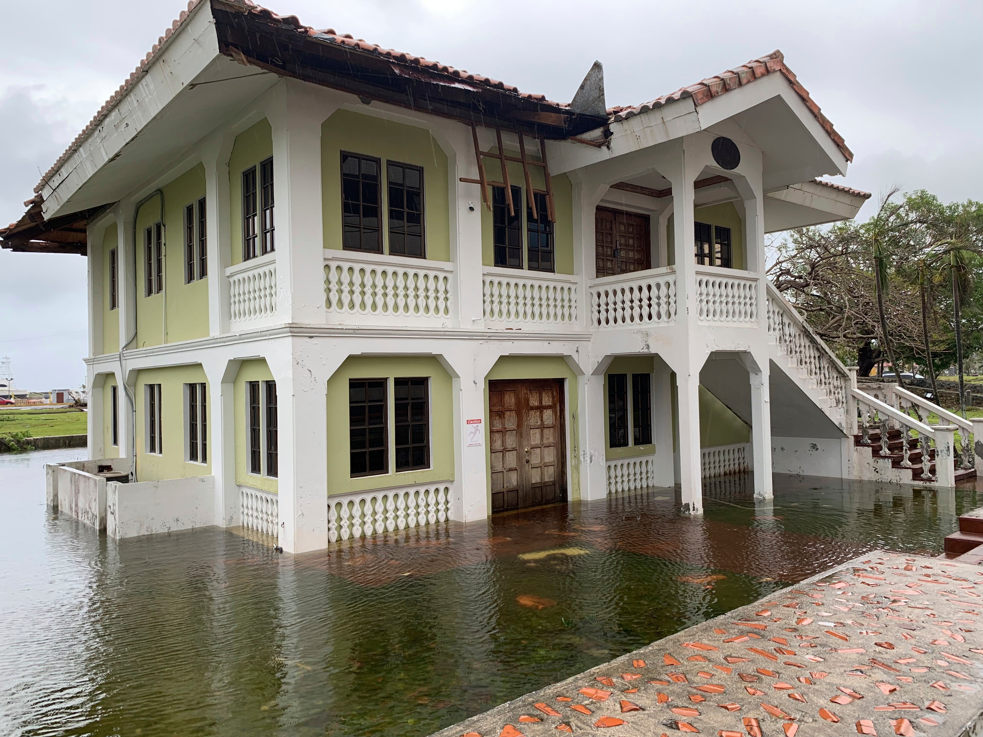 A building is flooded in Hagatna, Guam, Thursday, May 25, 2023, after Typhoon Mawar went through the area