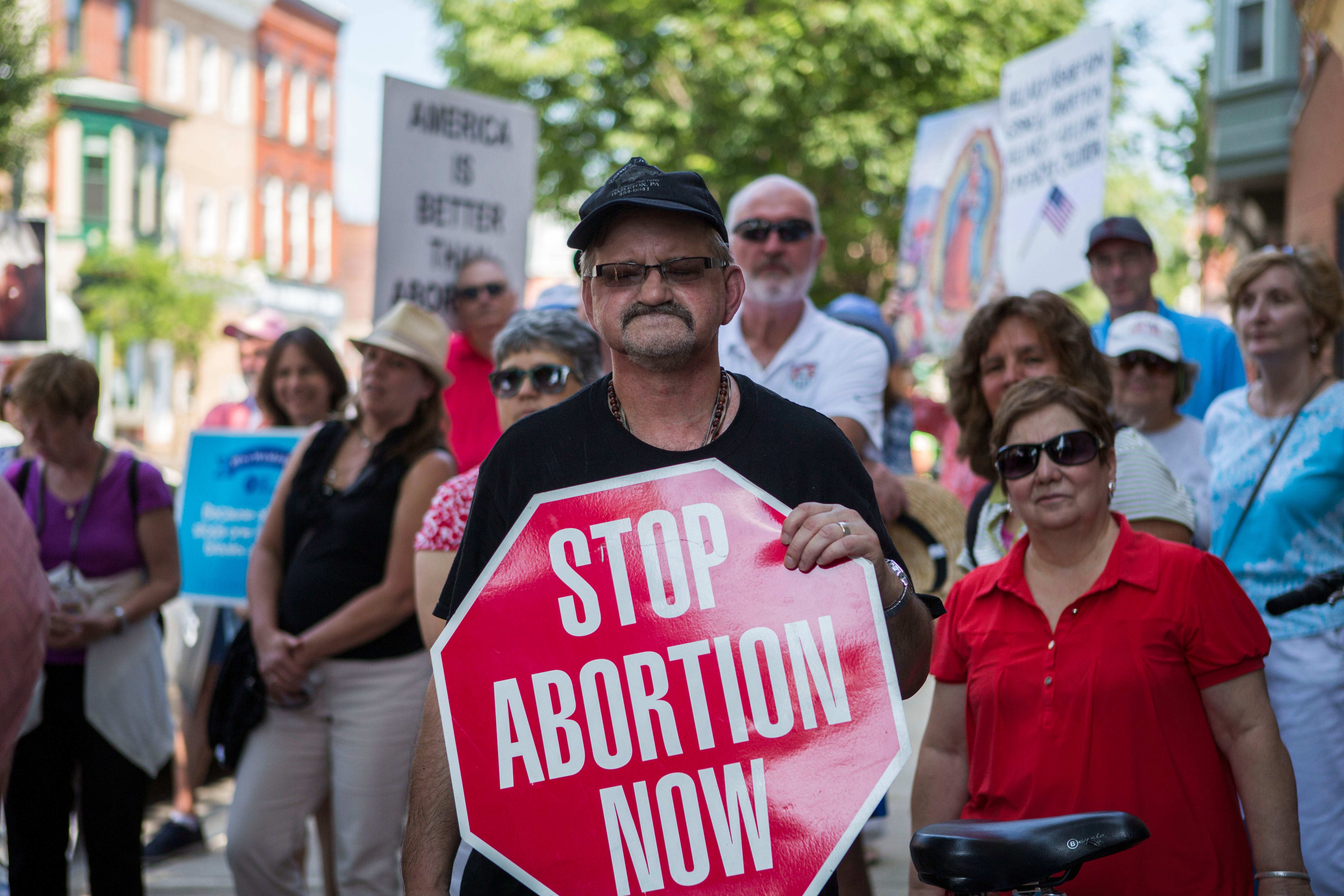 Anti-abortion activists hold a rally outside Gosnell’s shuttered clinic in 2016