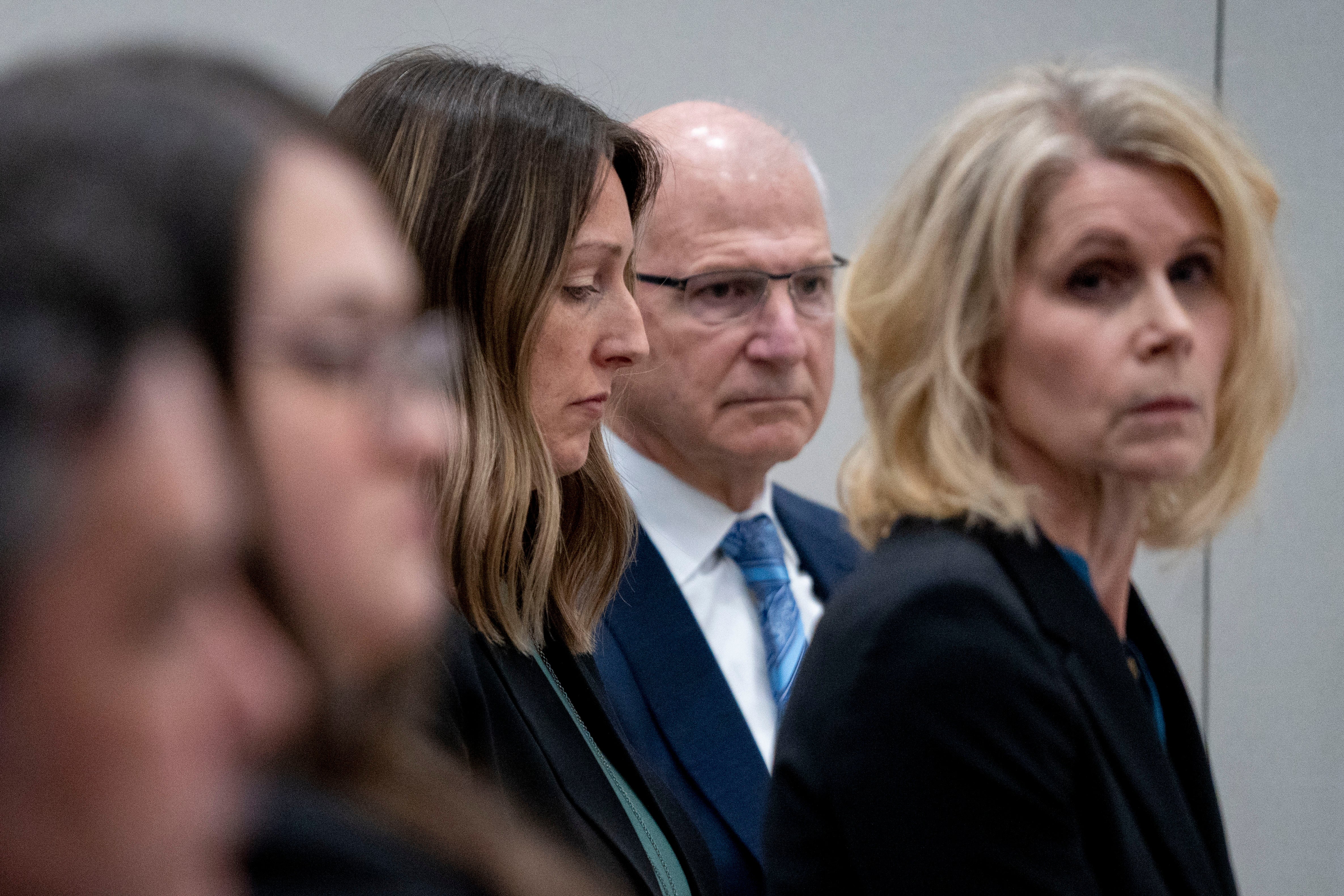 Dr Bernard, centre, appears with her legal team at an Indiana medical board hearing on 25 May.