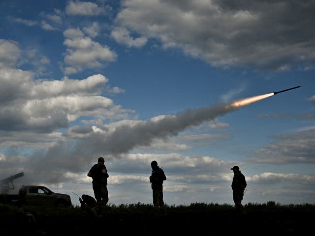 <p>Ukrainian servicemen fire a multiple-launch rocket system towards Russian troops in the Zaporizhia region</p>