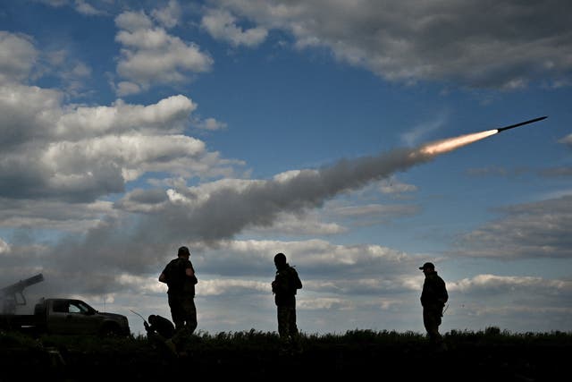 <p>Ukrainian servicemen fire a multiple-launch rocket system towards Russian troops in the Zaporizhia region</p>