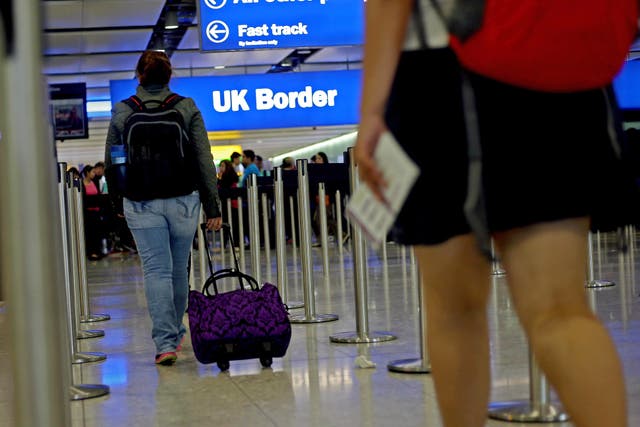 Passengers arriving into the UK have experienced delays (PA)