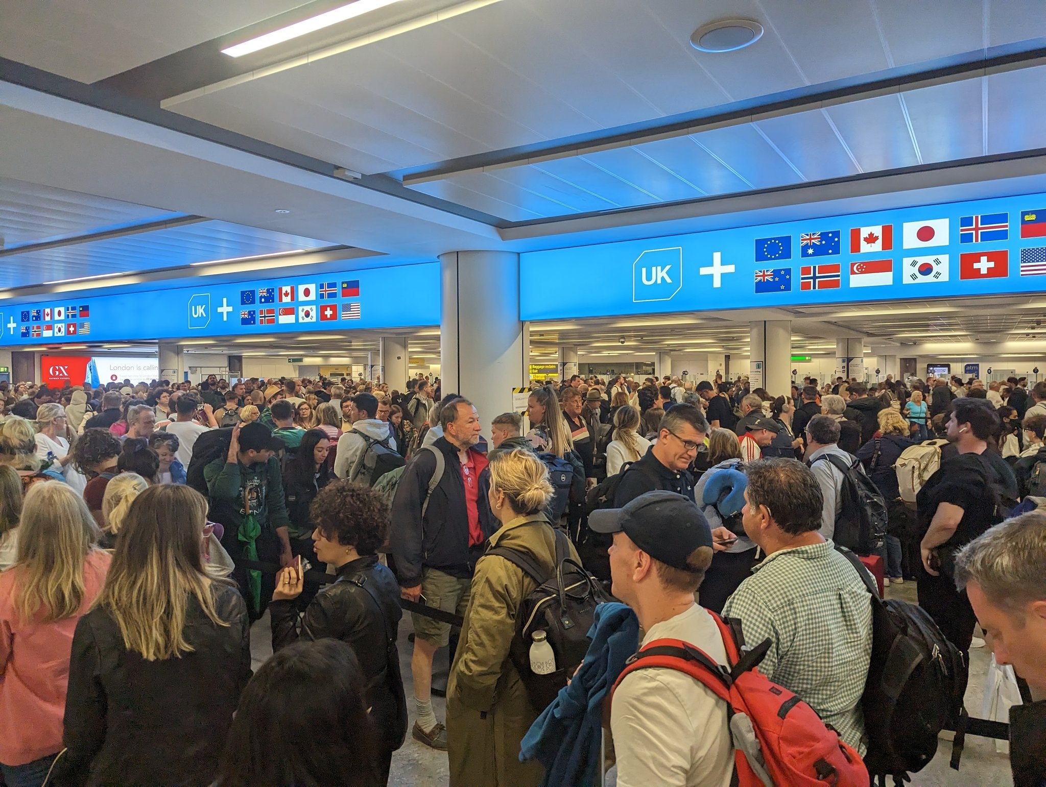The traveller posted a series of pictures of people waiting at border control in long queues on Twitter, with the caption, “Absolute chaos at Gatwick”
