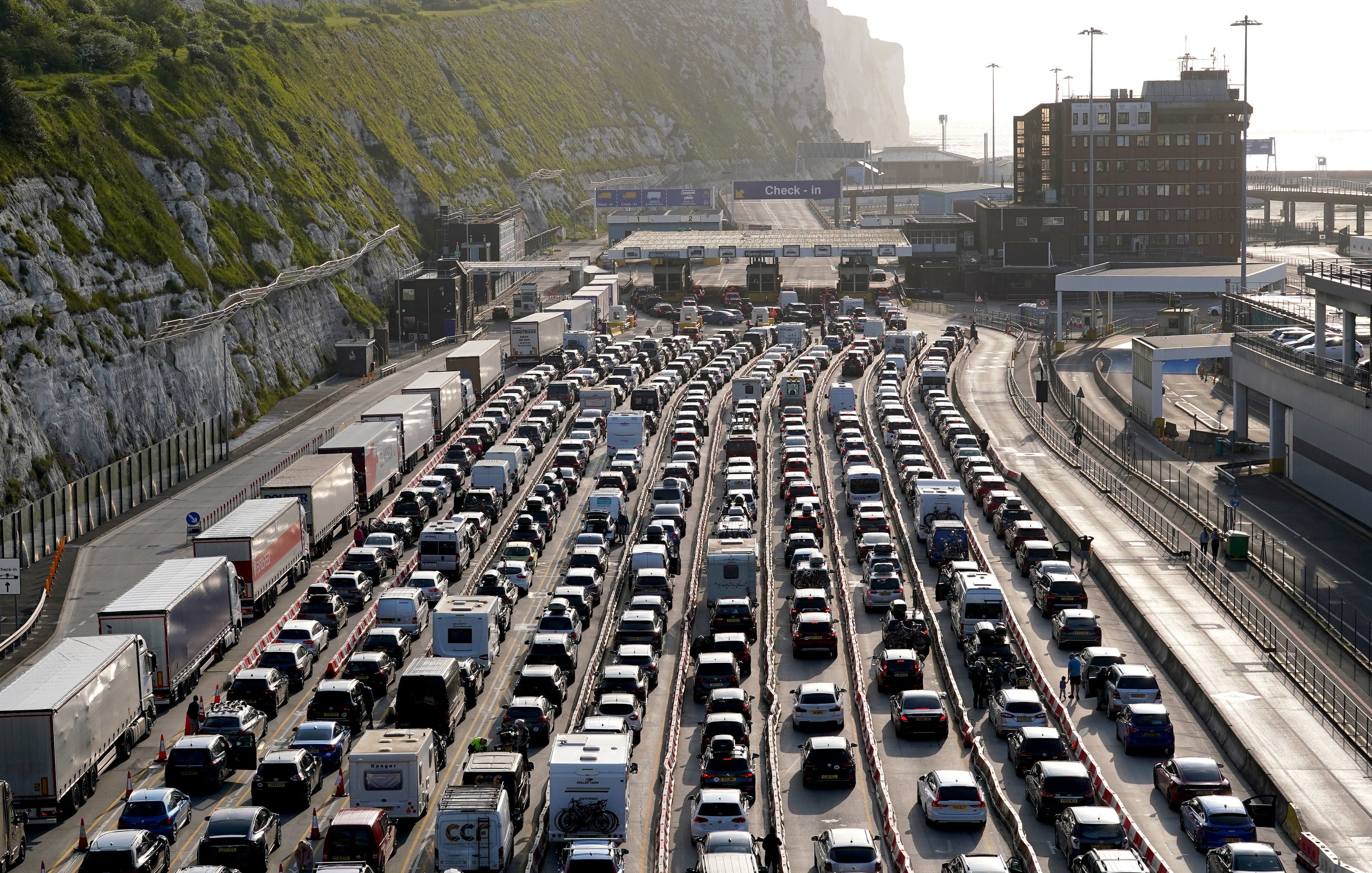 <p>Passengers queue for ferries at the Port of Dover in Kent as the getaway for half term and the bank holiday weekend continues</p>