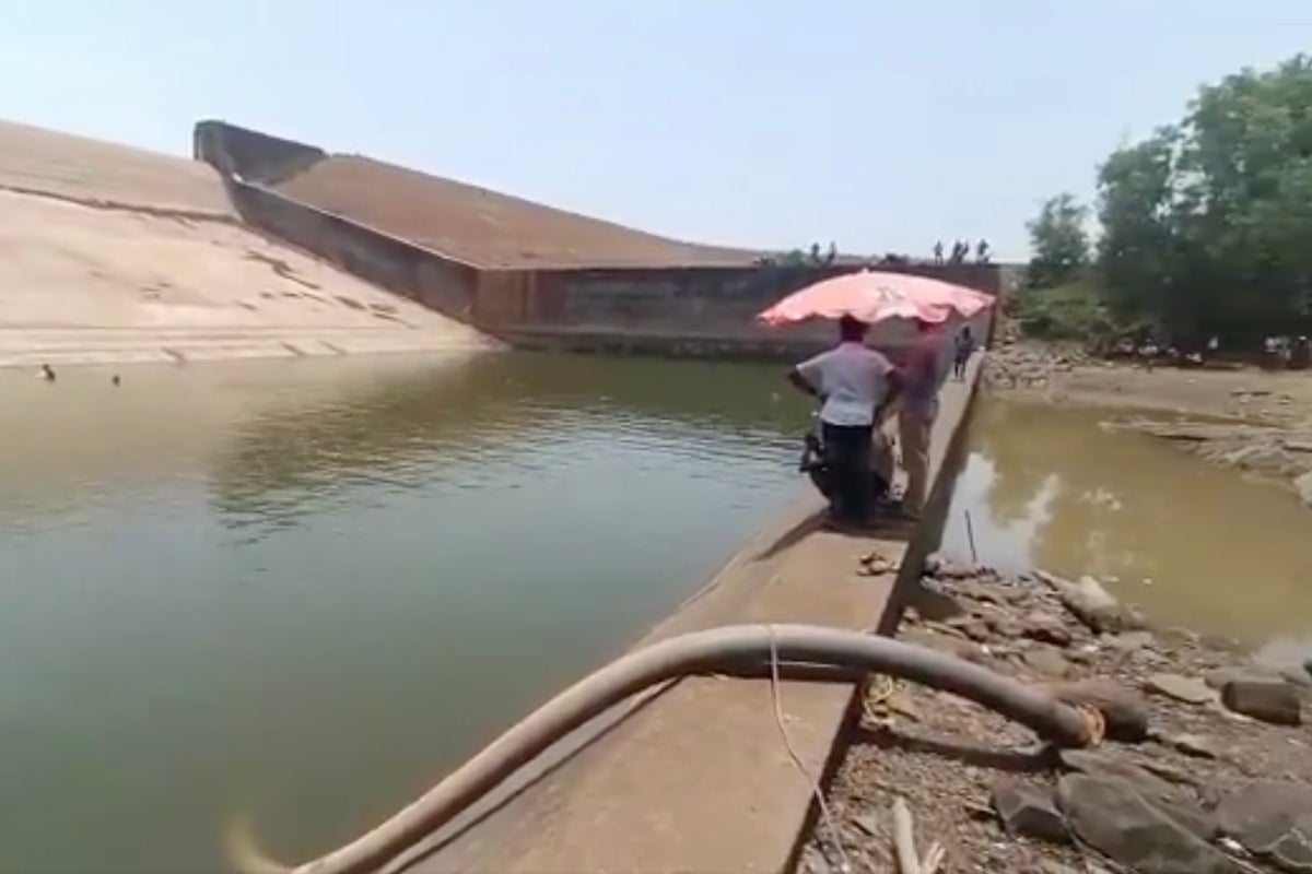 Government official drains a dam to get his phone back