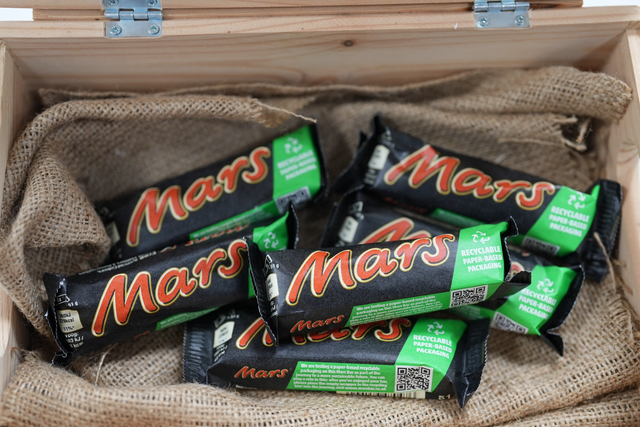 The temporary new look paper- packaged Mars bars will be available in Tesco stores (Mars Wrigley/PA)