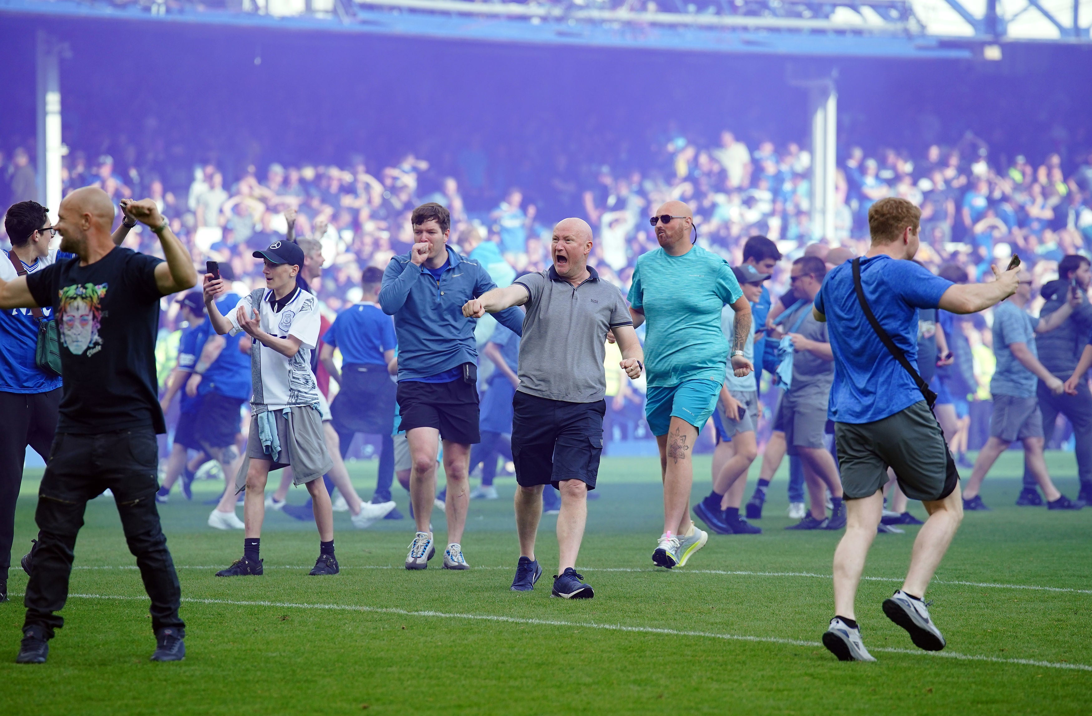 Jubilant Everton invade the pitch after the final whistle
