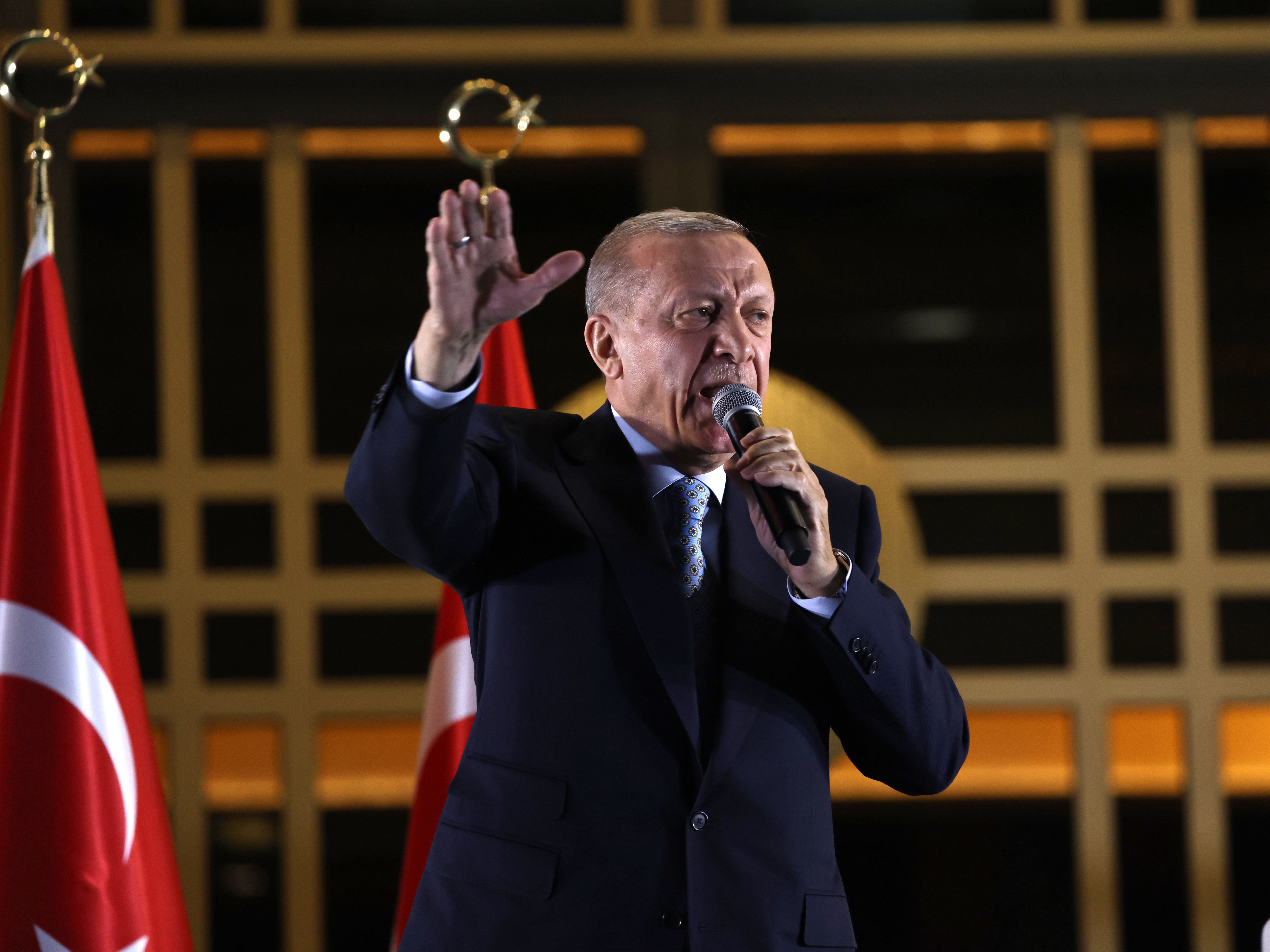 Erdogan addresses supporters outside his palace in Ankara on Sunday evening