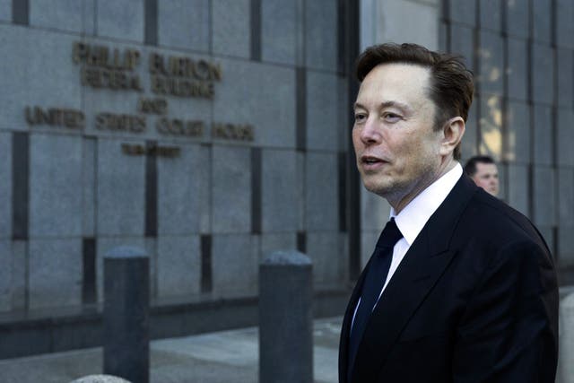 <p>Elon Musk departs the Phillip Burton Federal Building and United States Court House in San Francisco on 24 January 2023 </p>