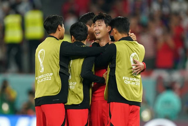 South Korea are skippered by Tottenham forward Son Heung-min (facing, Mike Egerton/PA))