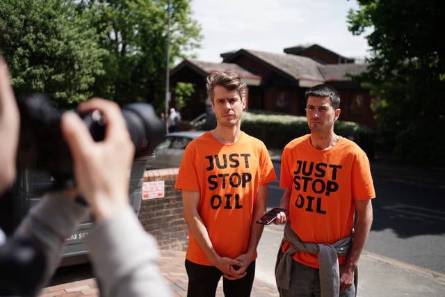 Just Stop Oil protesters Samuel Johnson and Patrick Hart, left, at Wimbledon Magistrates’ Court (Jordan Pettitt/PA)