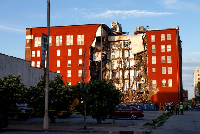 <p>Emergency crews work the scene of a partial apartment building collapse in Davenport, Iowa</p>