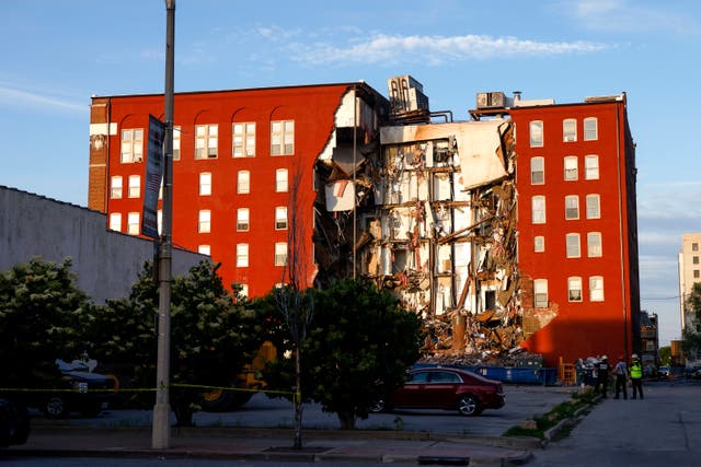 <p>Emergency crews work the scene of a partial apartment building collapse in Davenport, Iowa</p>