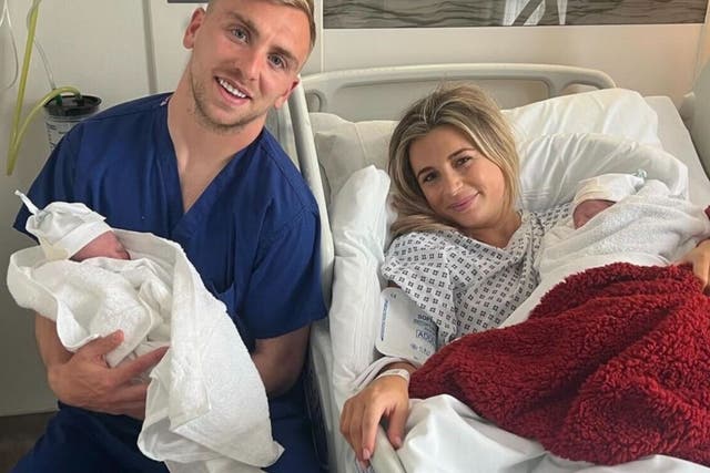 <p>Dani Dyer and Jarrod Bowen hold their newborn twin daughters</p>