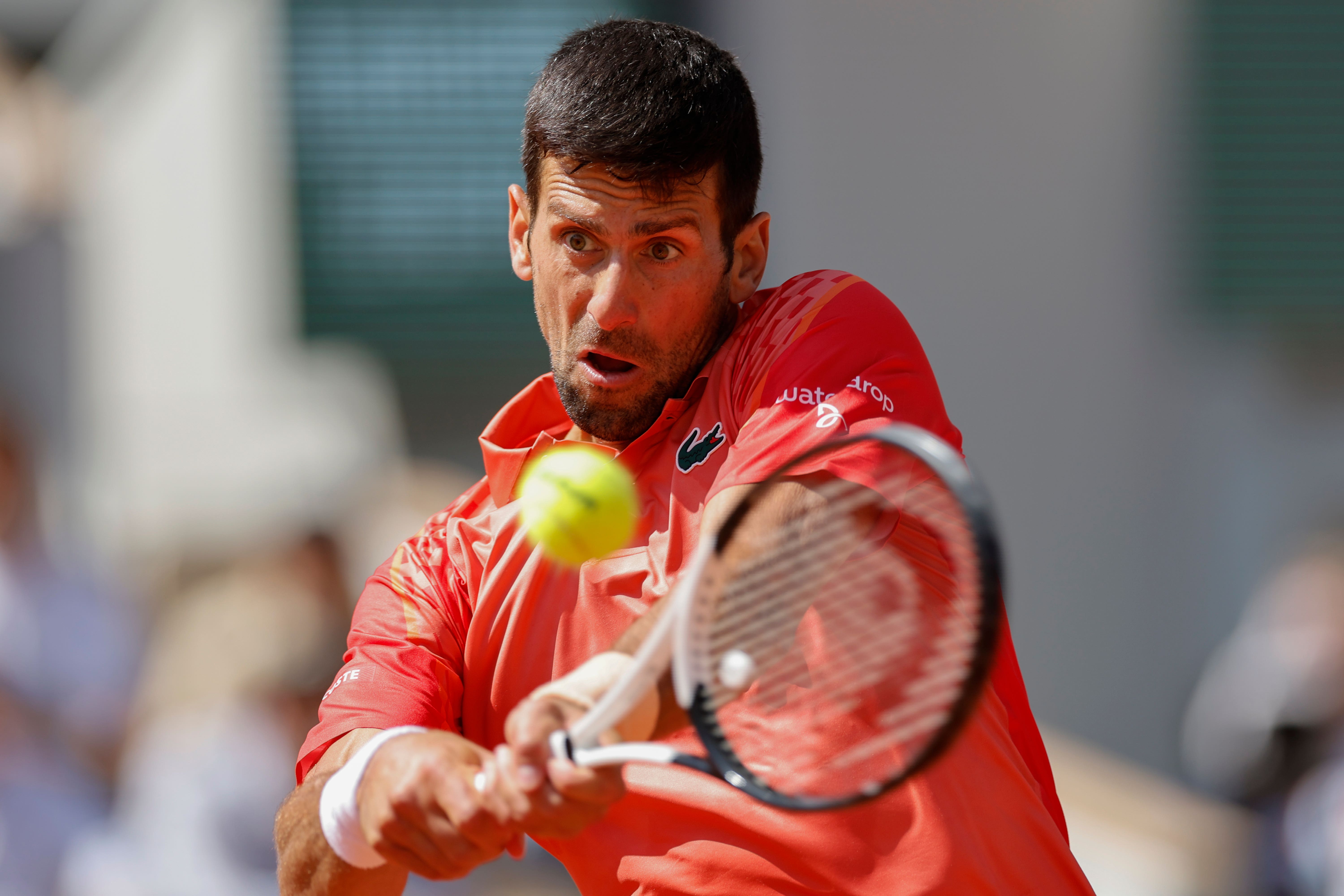 Novak Djokovic into French Open second round as Serb sees off big