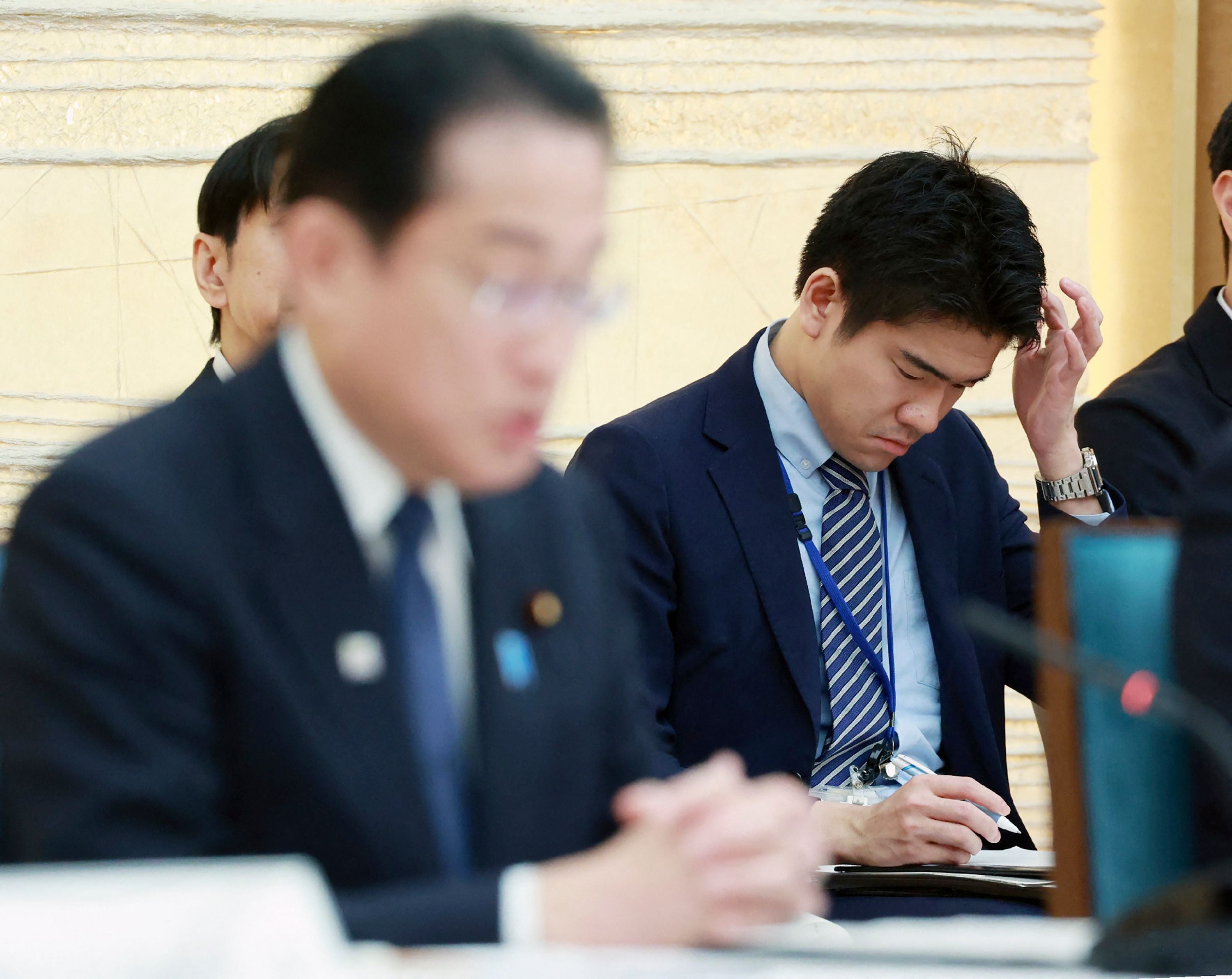 Shotaro Kishida (R), son of Japan’s prime minister Fumio Kishida, attending a meeting at the prime minister’s office
