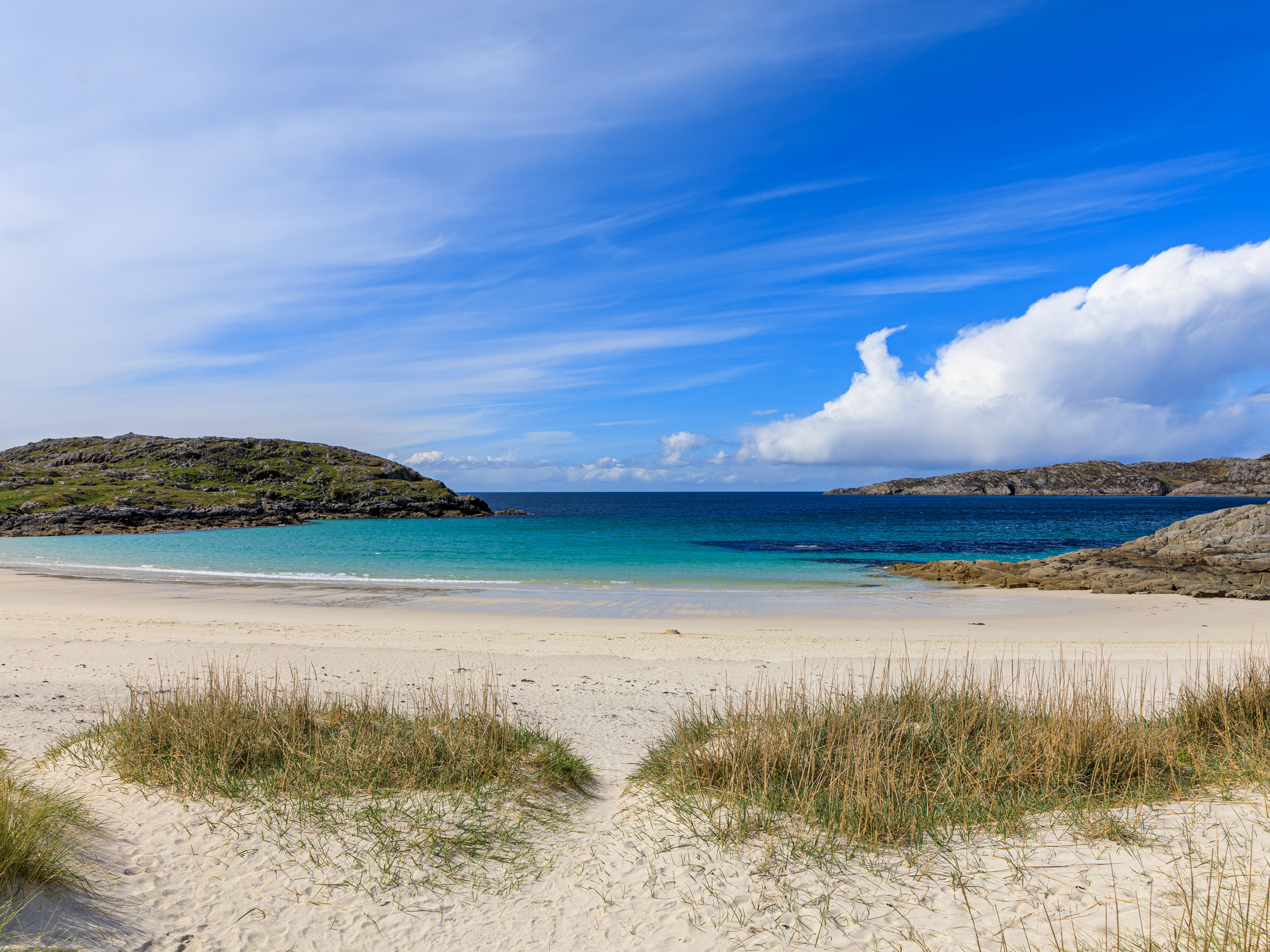 A view of Achmelvich Beach, one of Scotland’s best, from the sand dunes