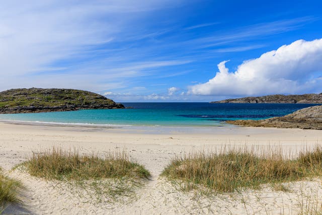 <p>A view of Achmelvich Beach, one of Scotland’s best, from the sand dunes </p>