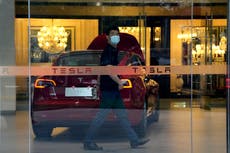 China's industry minister, Tesla's Musk meet, discuss electric cars