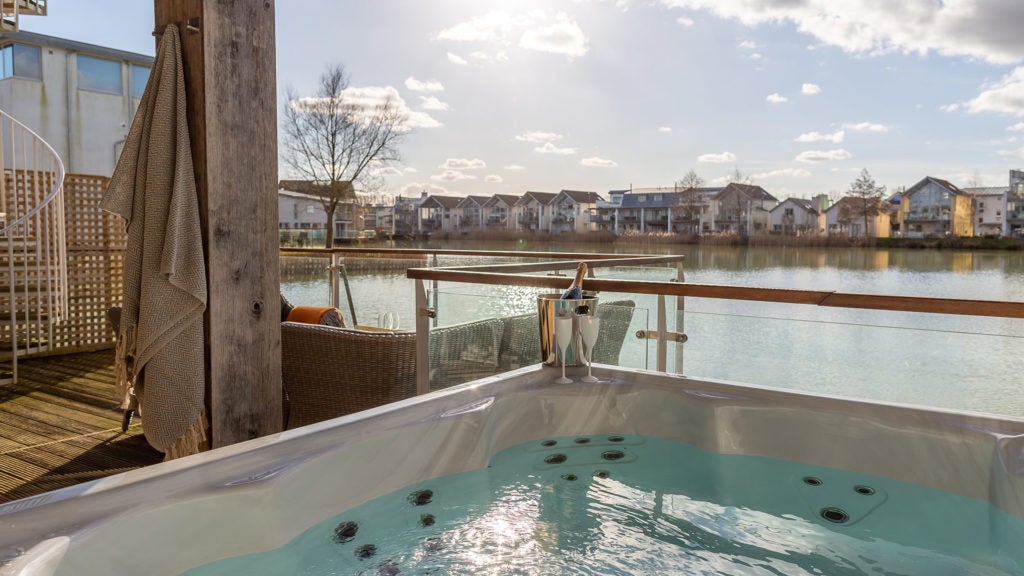 With a hot tub, cinema room and direct lake access, take the whole family to Tamarisk