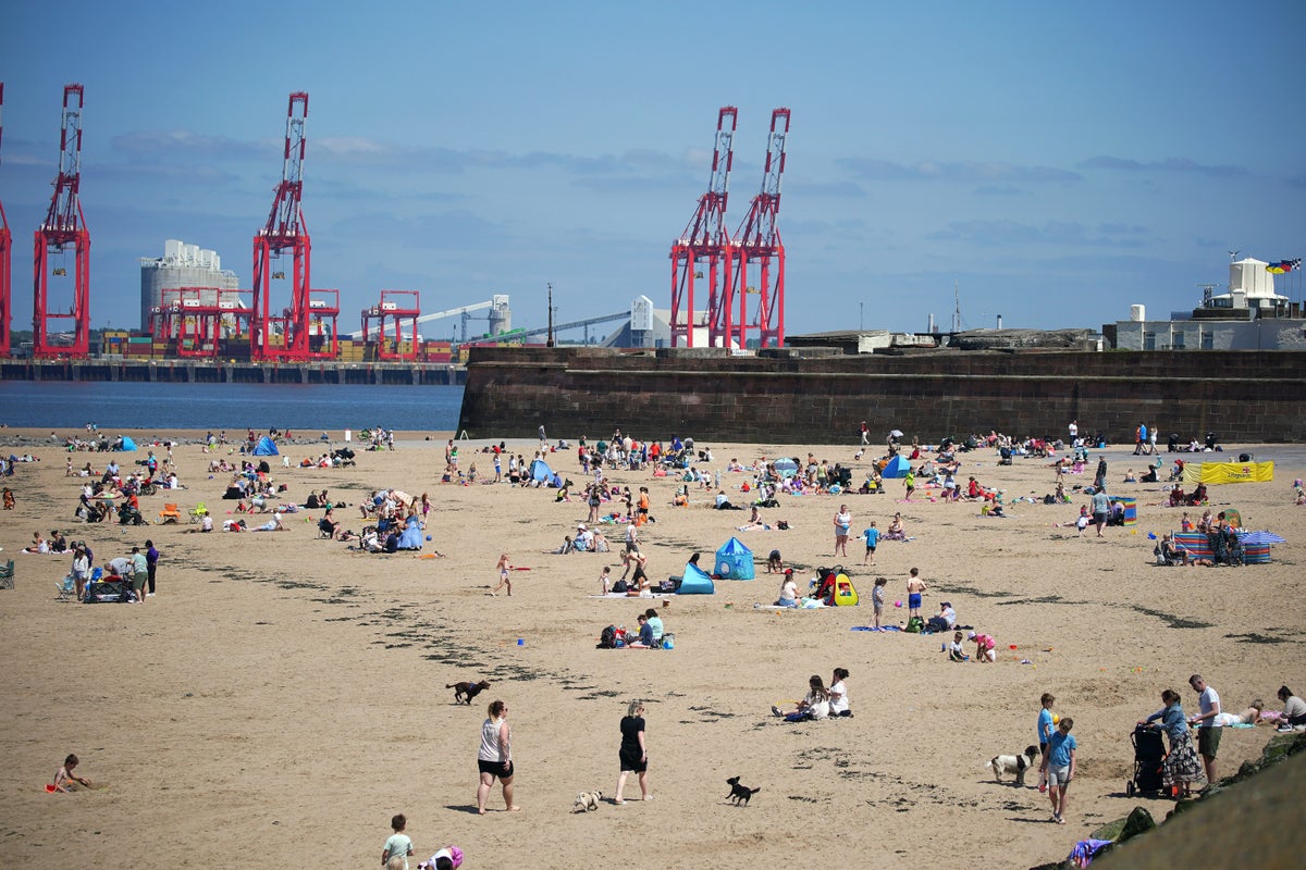 UK enjoys hottest day of year so far at nearly 25C
