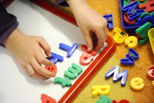 The Government is to support eligible parents with their first month of childcare costs when they either enter work or increase their hours (Dominic Lipinski/PA)