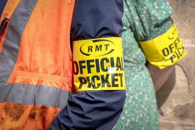 RMT members on the picket line (Jane Barlow/PA)