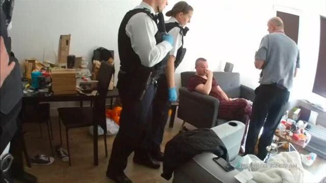 <p>Mark Gould being arrested by police  </p>