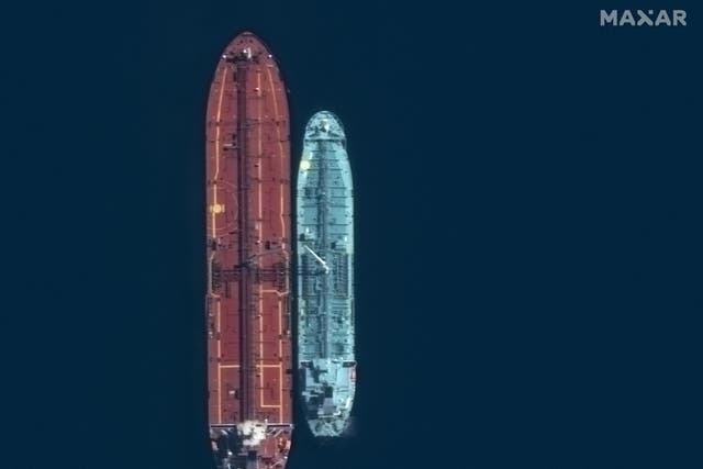 <p>A satellite image taken on 20 March 2023 by Maxar Technologies shows a ship-to-ship transfer in Lakonikos Bay </p>