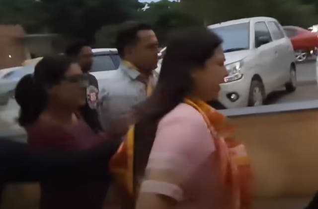 <p>Meenakshi Lekhi (centre) seen here running away from a reporter asking her about India’s top wrestlers protesting sexual harassment </p>