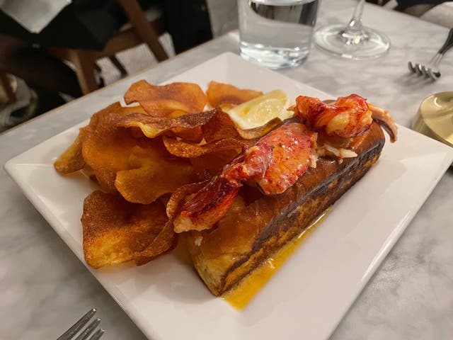 <p>New England lobster roll with house-made crisps are a must-have</p>