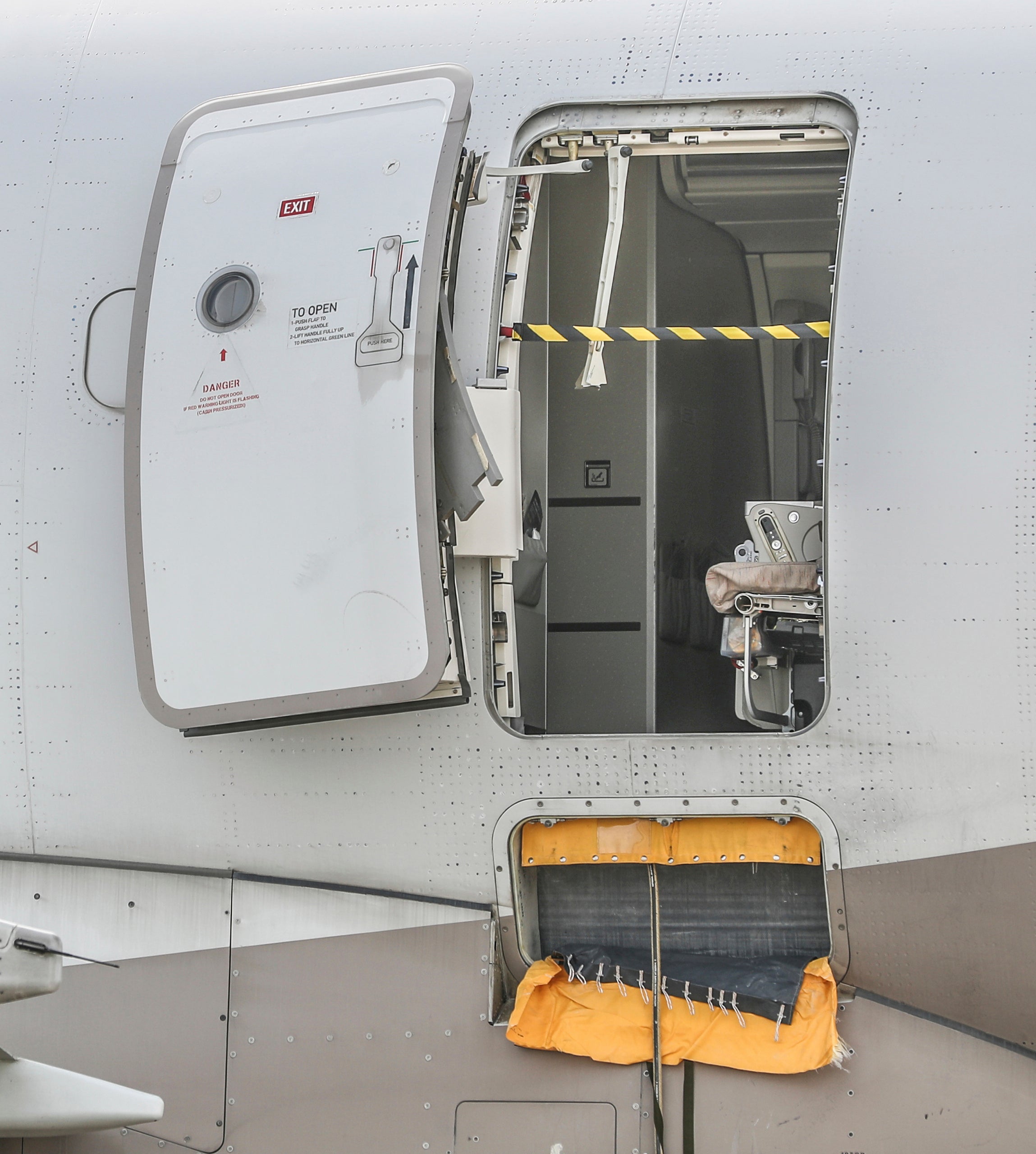 The door of the plane was opened in mid air, 700ft above the ground
