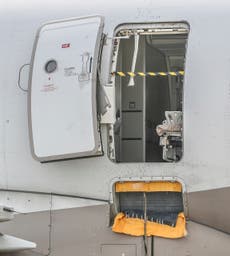 Plane passenger who held down man who opened door midair ‘feared he would die’