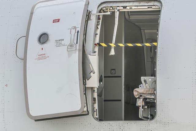 <p>An emergency exit door of an Asiana Airlines plane is seen at Daegu International Airport in Daegu, South Korea, Friday, May 26, 2023</p>