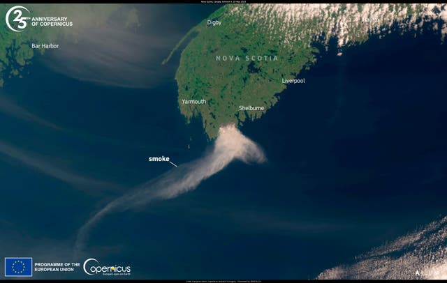 <p>An image capture by the Copernicus Sentinel-3 satellite on Monday shows the thick plume of smoke heading south from wildfires which are devastating the province of Nova Scotia in eastern Canada</p>