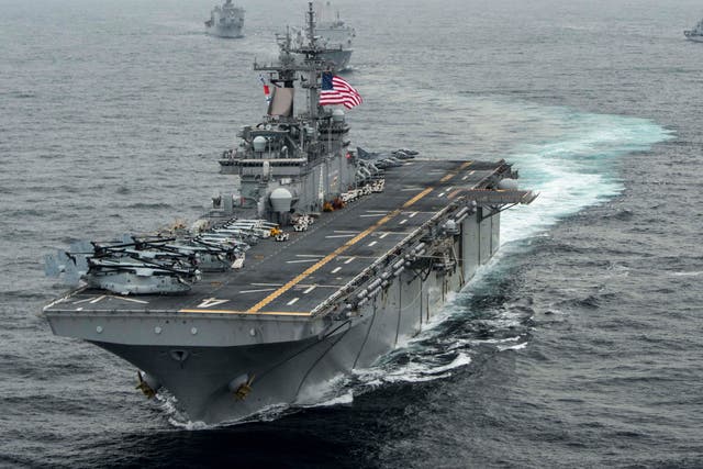 <p> In this handout photo provided by the US Navy, the amphibious assault ship USS Boxer (LHD 4) transits the East Sea in 2016 </p>