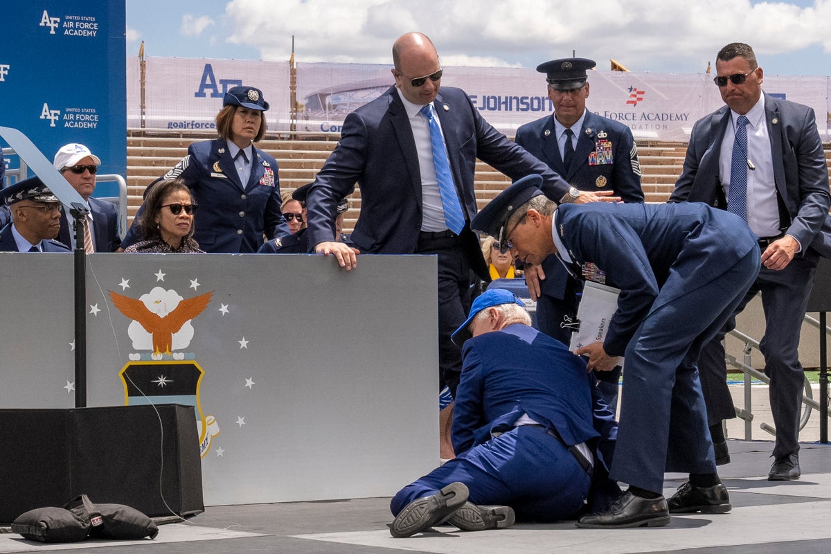 Biden trips and falls on stage at Air Force graduation; White House says he's 'fine'