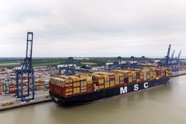 The world’s largest cargo ship MSC Loreto prepares to leave the Port of Felixstowe in Suffolk after her maiden call to the UK (Joe Giddens/PA)